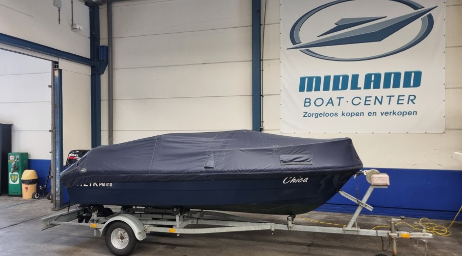 Myzyk PM 410 met Suzuki DF9,9 en trailer