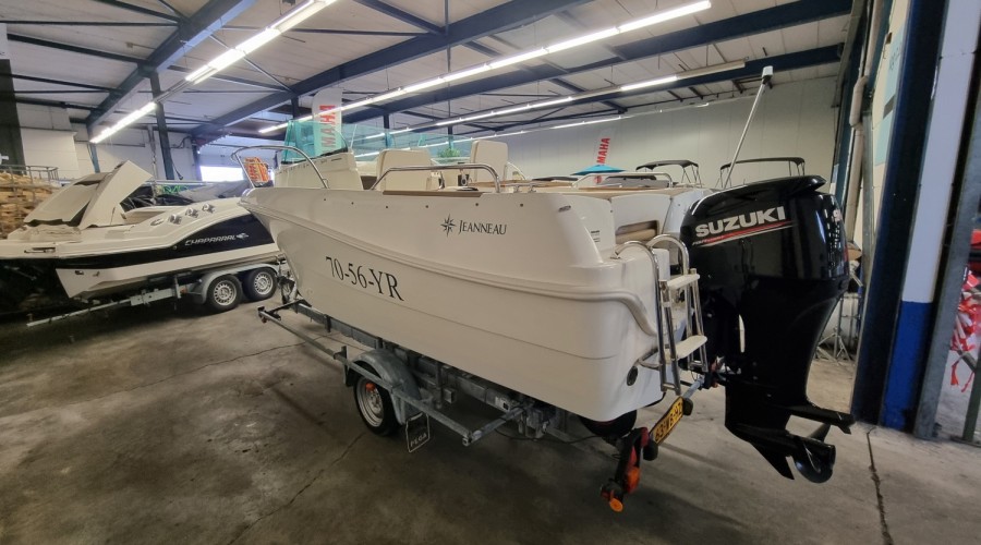 Jeanneau Merry Fisher 585 met Suzuki DF90A en trailer